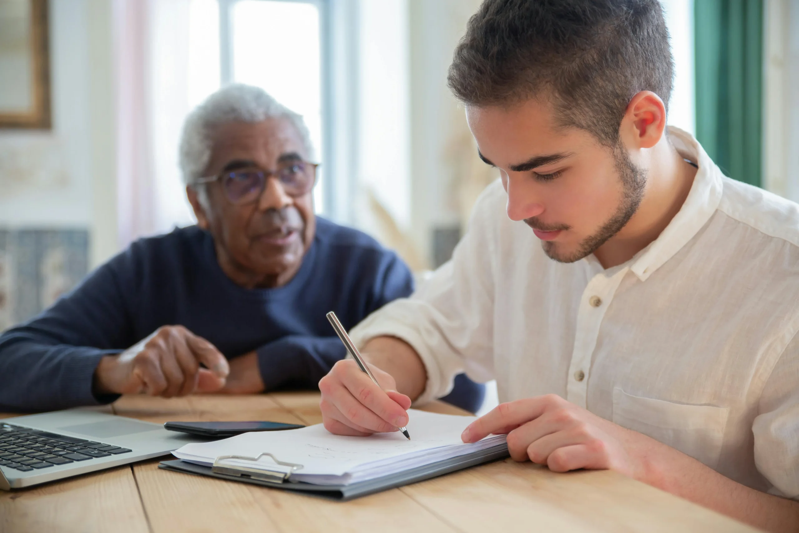 caregiver helping the elderly