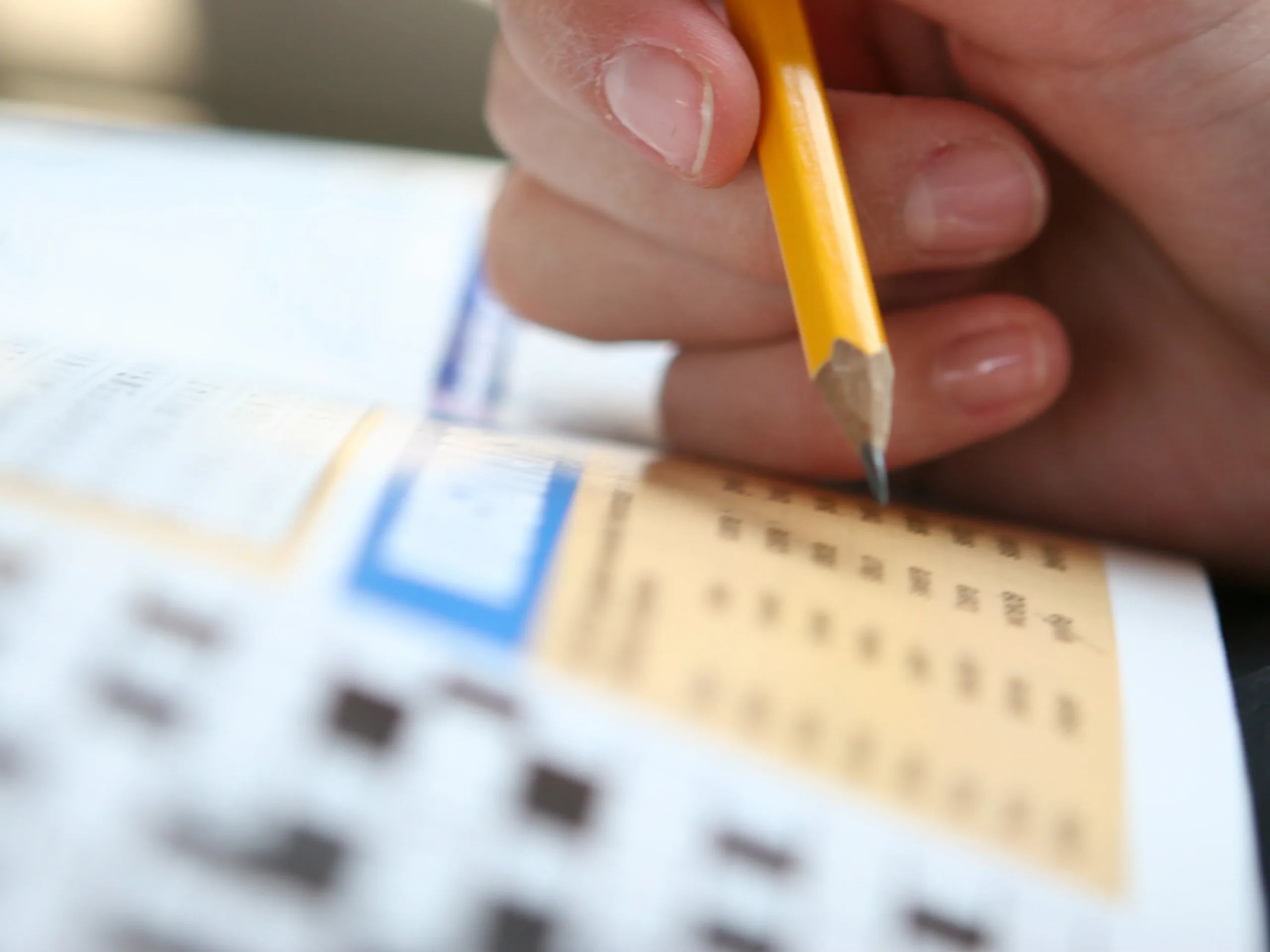 playing a word game on a paper